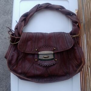 Unique vintage 90s 100% Cow leather purse... Brown